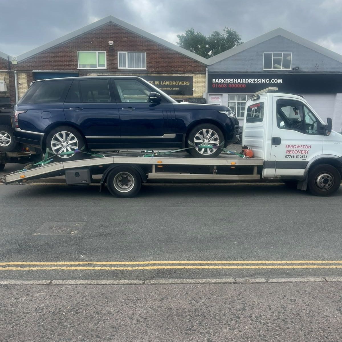 Sprowston Recovery transporting a large car in Norwich